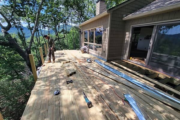 The Benefits of Hiring a Professional Deck Builder vs. DIY